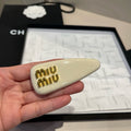CHANEL HAIR CLIPS IN BEIGE SHINY METAL (ONE PAIR)