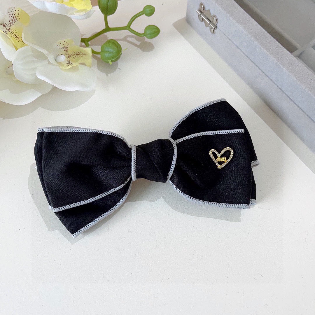 CHANEL BOW HAIRPIN IN BLACK AND WHITE TRIM COTTON 406022