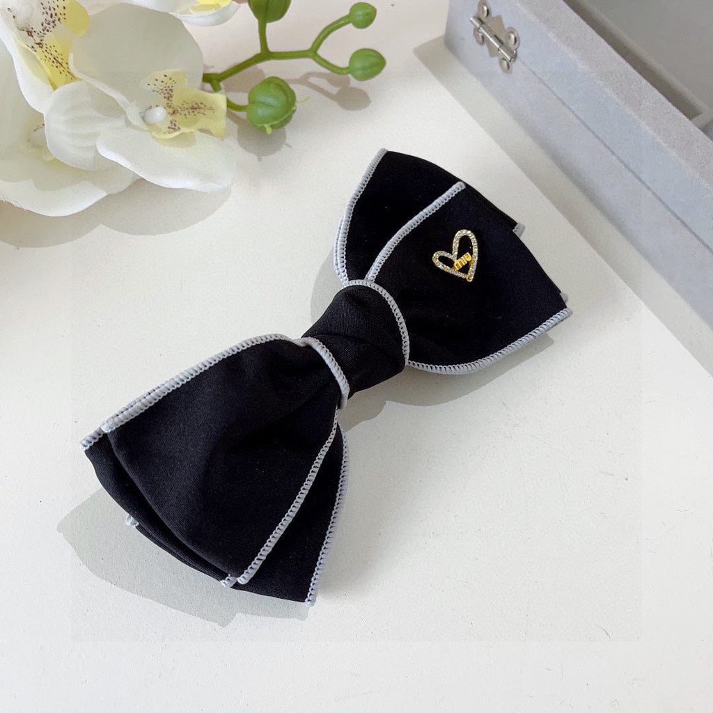 CHANEL BOW HAIRPIN IN BLACK AND WHITE TRIM COTTON 406022