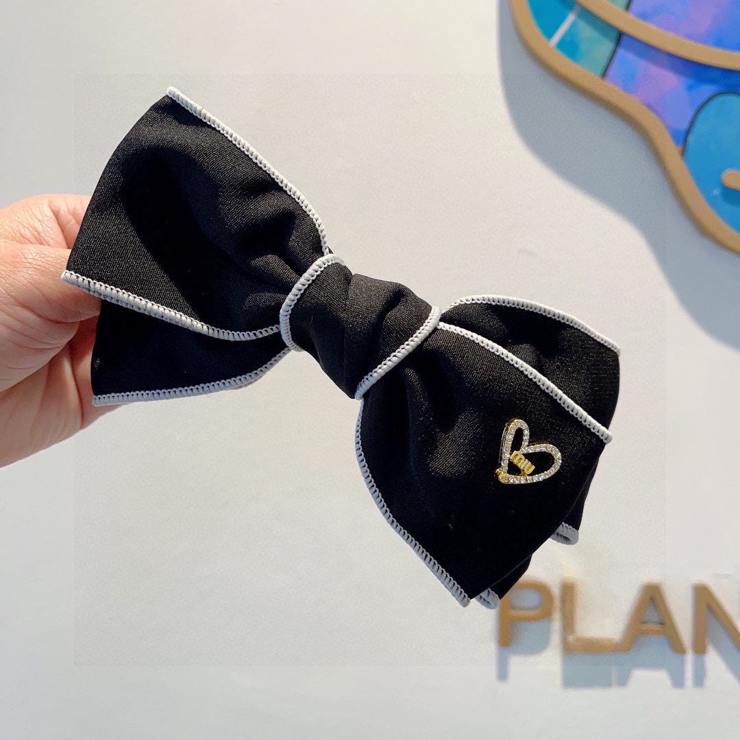 CHANEL BOW HAIRPIN IN BLACK AND WHITE TRIM COTTON 406022