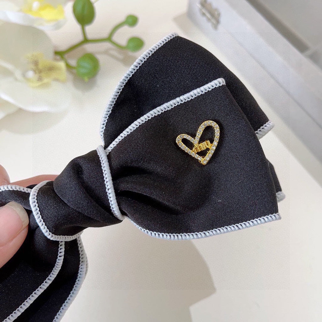 CHANEL BOW HAIRPIN IN BLACK AND WHITE TRIM COTTON 406022