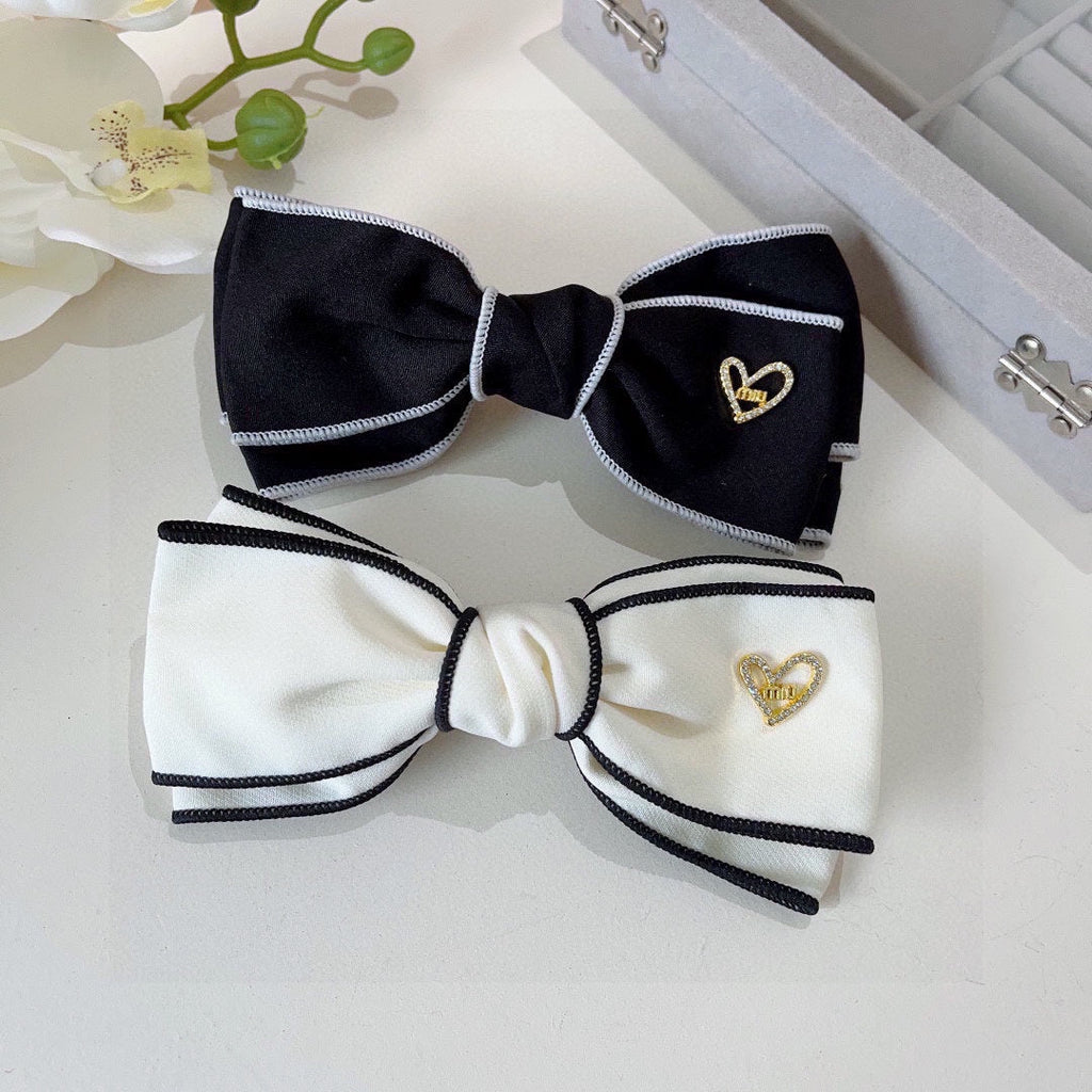 CHANEL BOW HAIRPIN IN BLACK AND WHITE TRIM COTTON 406022