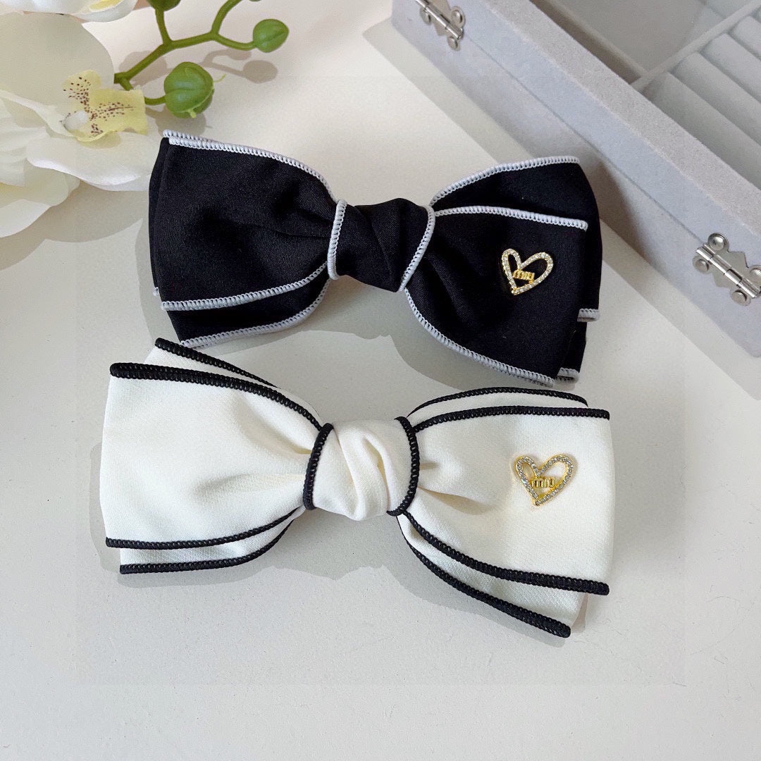 CHANEL BOW HAIRPIN IN BLACK AND WHITE TRIM COTTON 406022